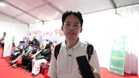 Edward (26), pengunjung asal Bekasi yang menggunakan fasilitas Cek Kesehatan Gratis saat Imlek Festival 2577 di Lapangan Banteng, Kamis, (26/2/2026). Foto: Dok. Bakom RI