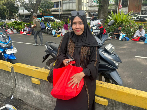 Sari (45) warga dari Bogor. Foto: Nauval Pratama/kumparan