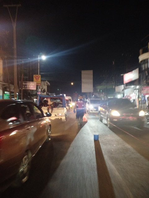 Situasi arus lalu lintas di kawasan wisata Puncak, Cianjur pada hari kedua Lebaran mengalami lonjakan hingga 70 persen, Minggu (22/3). Foto: Dok. kumparan