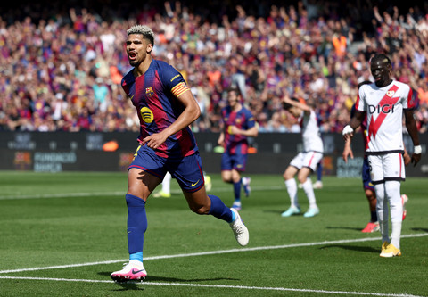 Pertandingan La Liga mempertemukan FC Barcelona melawan Rayo Vallecano di Camp Nou, Barcelona (22/3). Foto: Josep Lago/AFP