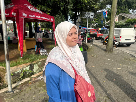 Umu Aqila (43), warga Ciracas yang mudik ke Majalengka, Jawa Barat. Foto: Nauval Pratama/kumparan