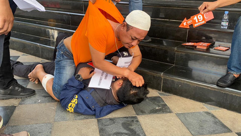 Adegan rekonstruksi kasus pembunuhan wanita oleh mantan suami sirinya di Tangsel. Foto: Dok. Istimewa