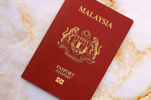 Ilustrasi Paspor Malaysia. Foto: Mehaniq/Shutterstock