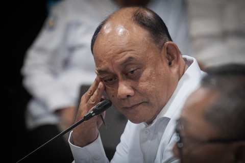 Kepala Badan Gizi Nasional Dadan Hindayana memberikan reaksi saat para menteri, perwakilan lembaga, dan pemangku kepentingan menghadiri rapat koordinasi pelaksanaan Program Makan Bergizi Gratis (MBG) di Kementerian Koordinator Bidang Pangan, Jakarta, Foto: Yasuyoshi Chiba/AFP