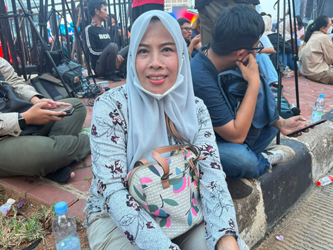 Yayan (51) pengunjung yang hadir di HUT DKI Jakarta, Bundaran HI. Foto: Kevin Kurnianto/kumparan