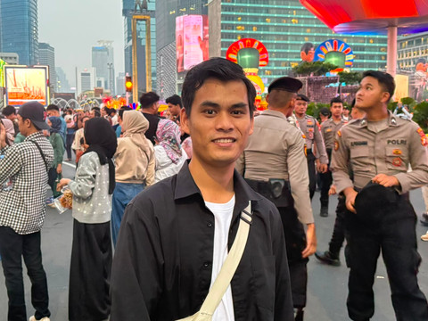 Nius (22) pengunjung yang hadir di HUT DKI Jakarta, Bundaran HI. Foto: Kevin Kurnianto/kumparan