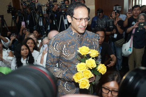 Mantan Menteri Pendidikan Indonesia, Nadiem Makarim, tiba untuk persidangannya di Pengadilan Tindak Korupsi di Jakarta pada 12 Januari 2026. Foto: Iqbal Firdaus/kumparan
