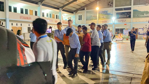 Jenazah Pilot WN Amerika di tempat persemayaman terakhir. Foto: Dok. Polri