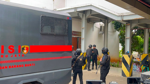 Suasana di Gudang Umum tertutup Polda Metro Jaya jelang pelimpahan barang bukti Kasus FA dan DR ke Kejagung. Foto: Rayyan Farhansyah/kumparan