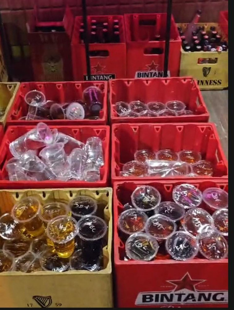 Satuan Polisi Pamong Praja (Satpol PP) Solo membongkar penjualan minuman beralkohol golongan B dan C tanpa izin di outlet Ruang Bahagia, kawasan Lokananta, Solo, Sabtu (19/7/2026). Foto: Dok. Satpol PP Kota Solo