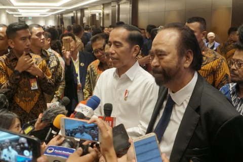 Presiden Joko Widodo dan Surya Paloh usai menghadiri di HUT 8 NaDem, Jakarta, pada Senin (11/11). Foto: Helmi Afandi Abdullah/kumparan