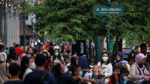 Pengunjung memadati kawasan wisata Malioboro, Yogyakarta, Kamis (11/3/2021). Foto: Andreas Fitri Atmoko/ANTARA FOTO