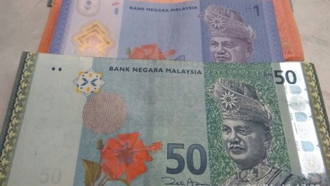 Ilustrasi Uang Ringgit Malaysia Foto:  Wendiyanto Saputro/kumparan