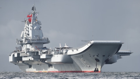 Ilustrasi Kapal induk China. Foto: AFP/Anthony WALLACE