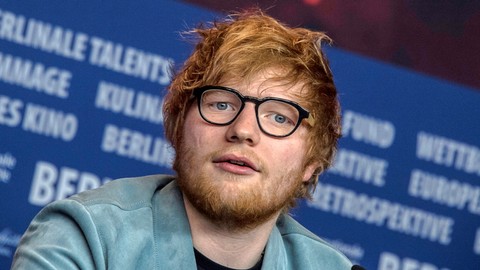 Penyanyi dan penulis lagu asal Inggris, Ed Sheeran berbicara dalam sebuah konferensi pers. Foto: AFP/John MACDOUGALL