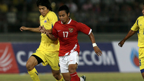 Atep (kostum merah) masih memperkuat Indonesia di SEA Games. Foto: Saeed Khan/AFP