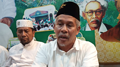 Ketua PWNU Jatim KH Marzuki Mustamar (kanan). Foto: Yuana Fatwalloh/kumparan