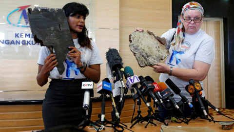 Benda diduga serpihan Malaysia Airlines MH370 ditemukan. Foto: Reuters/Lai Seng Sin