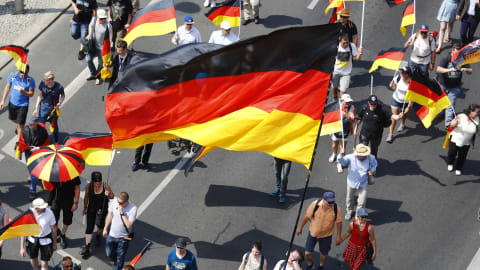 Ilustari bendera Jerman. Foto: REUTERS/Hannibal Hanschke