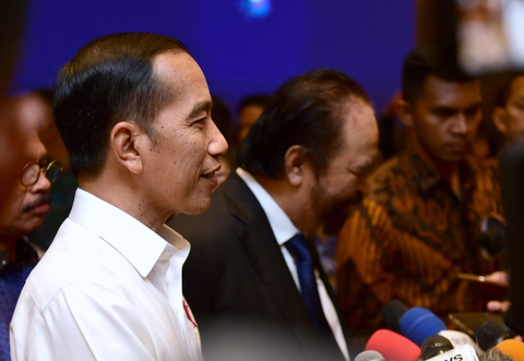 Presiden Jokowi dan Surya Paloh pada perayaan HUT ke-8 NasDem. Foto: Muchlis Jr - Biro Pers Sekretariat Presiden