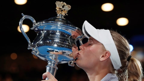Wozniacki rebut Grand Slam pertama. Foto: REUTERS/Issei Kato