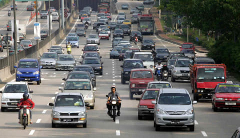 Ilustrasi jalan tol di Kuala Lumpur, Malaysia. Foto: AFP/JIMIN LAI