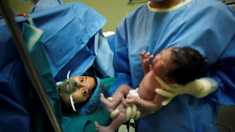 Kelahiran Bayi di China  Foto: Carlos Barria/Reuters