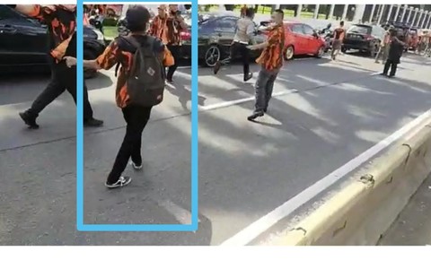 Foto Saat Polisi Polda Metro Dipukul Anggota Ormas di Depan DPR