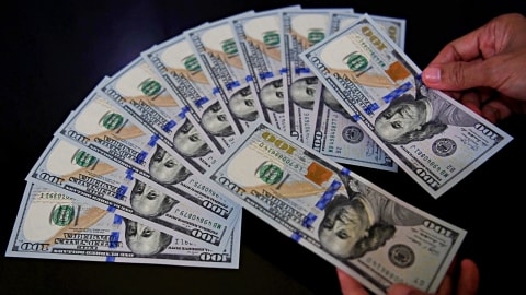 Dang Dolar AS. Foto: Antara/Puspa Perwitasari