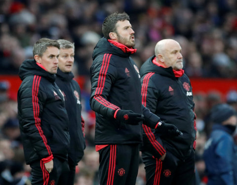 Staf kepelatihan Manchester United.  Foto: Reuters/Carl Recine