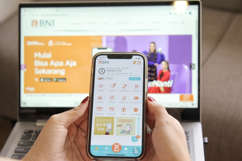 Ilustrasi pembayaran iuran BPJS Kesehatan lewat BNIdirect cash. Foto: Dok. Bank BNI