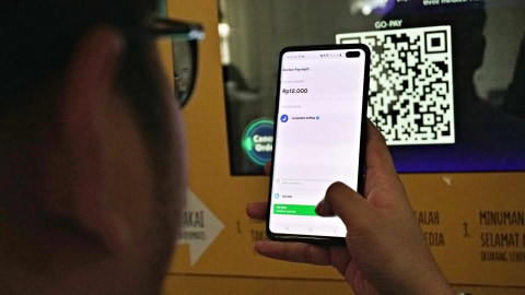 Ilustrasi transaksi dengan uang digital Gopay. Foto: Jamal Ramadhan/kumparan