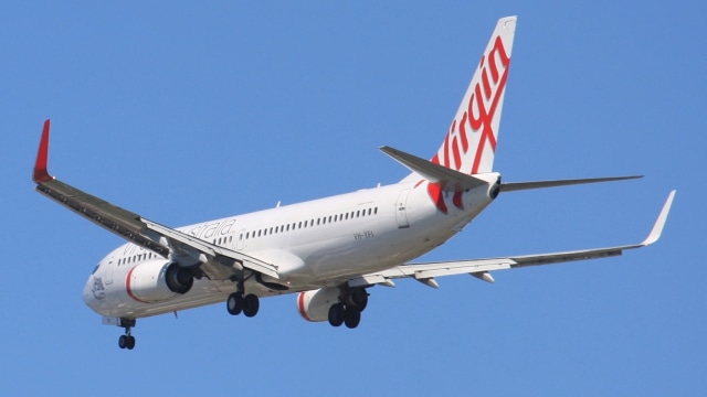 Pesawat Virgin Airlines sedang mengudara. (Foto: Andrew Thomas via Wikimedia)