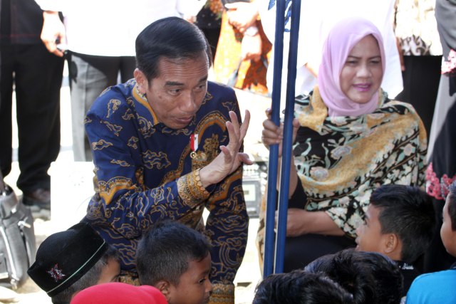 Presiden Joko Widodo dan Ibu Negara Iriana (Foto: Rahmad/antarafoto)