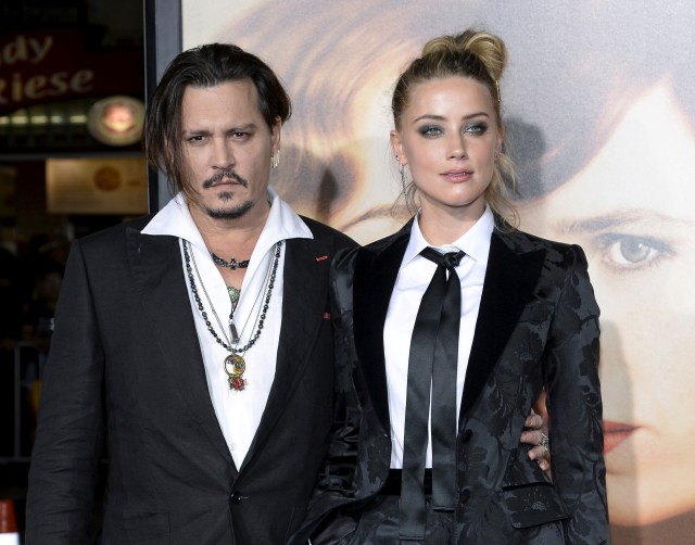 Johnny Depp dan Amber Heard resmi bercerai. Foto: Kevork Djansezian/Reuters