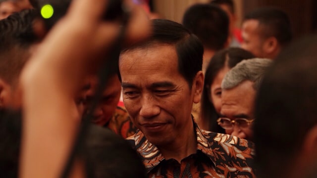 Presiden Jokowi ikut hadir di HUT PKPI ke-18. Foto: Fanny Kusumawardhani/kumparan