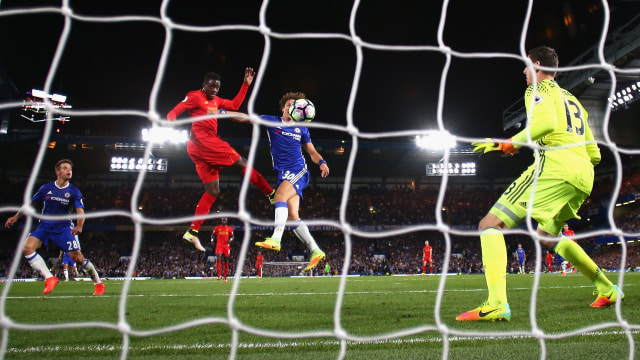 Salah satu duel Liverpool dan Chelsea. (Foto: Clive Rose/Getty Images)