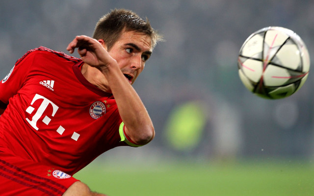 Si Jenius, Philipp Lahm (Foto: Marco Luzzani/Stringer)