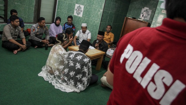 Akad nikah di kantor polisi (Foto: Mohammad Ayudha/ANTARA)