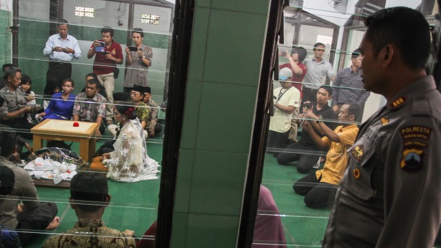 Akad nikah di kantor polisi (Foto: Mohammad Ayudha/ANTARA)