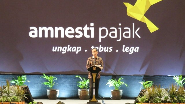 Jokowi memberikan sambutan di Tax Amnesti. Foto: Yudhistira Amran Saleh/kumparan