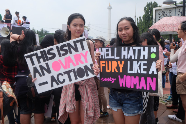 Poster seruan di Women's March. (Foto: Sattwika Duhita/kumparan)