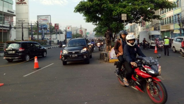 Contra flow mulai diterapkan di Depok. (Foto: Iqra Ardini/kumparan)