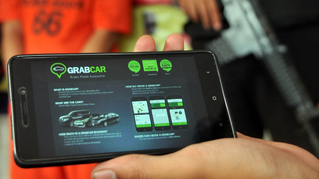 Aplikasi GrabCar. (Foto: Yulius Satria Wijaya/Antara )