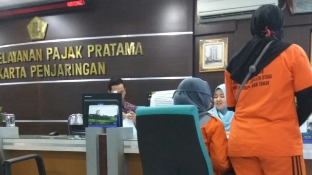 Pasukan oranye bayar pajak dan lapor SPT. (Foto: Dwi Sapta/warga)