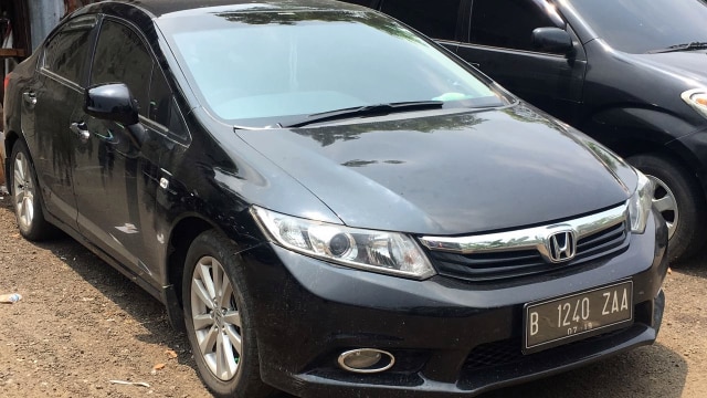 Mobil Ridho Rhoma di Polres Metro Jakarta Barat. (Foto: David Pratama/kumparan)