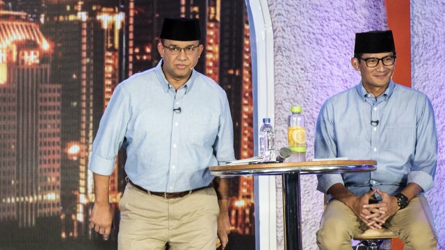 Anies-Sandi dalam debat pilgub DKI putaran 2. (Foto: Antara/M Agung Rajasa)