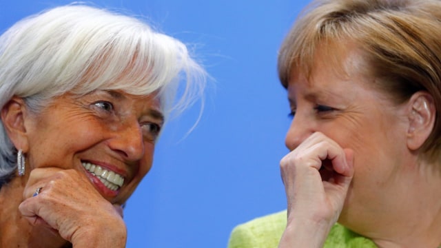 Merkel dan Managing Director IMF Christine Lagarde (Foto: REUTERS/Hannibal Hanschke)