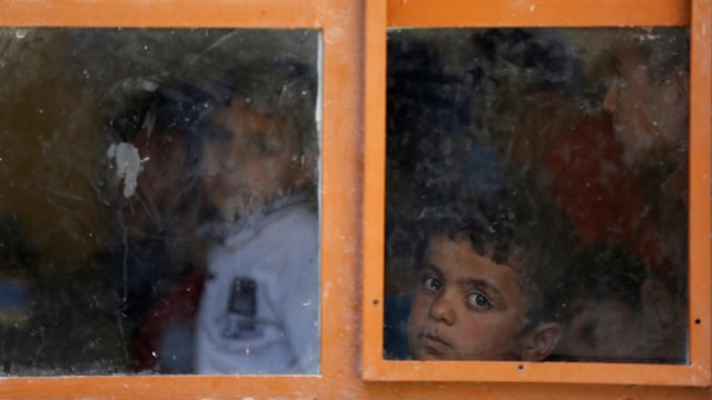 Anak-anak di Mosul Pergi Sekolah. (Foto: REUTERS/ Muhammad Hamed)