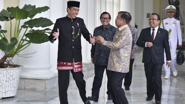 Tawa Presiden Jokowi dan Wapres Jusuf Kalla (Foto: Antara/Puspa Perwitasari)